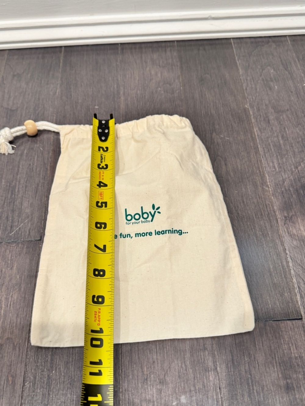 NWOT Baby 10” x 7” Canvas Drawstring Bag in Natural with Green Logo - Picture 5 of 6